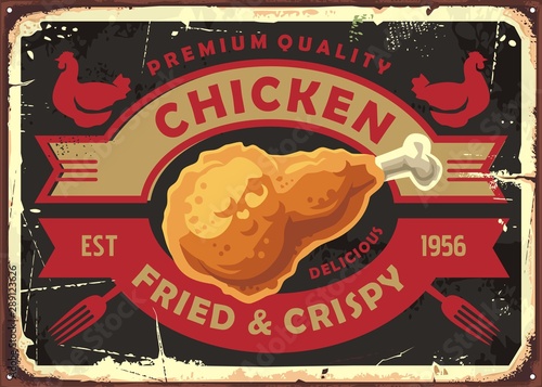 Fried and crispy chicken meat retro sign post with creative emblem. Chicken drumstick on old metal texture. Vintage food vector illustration.