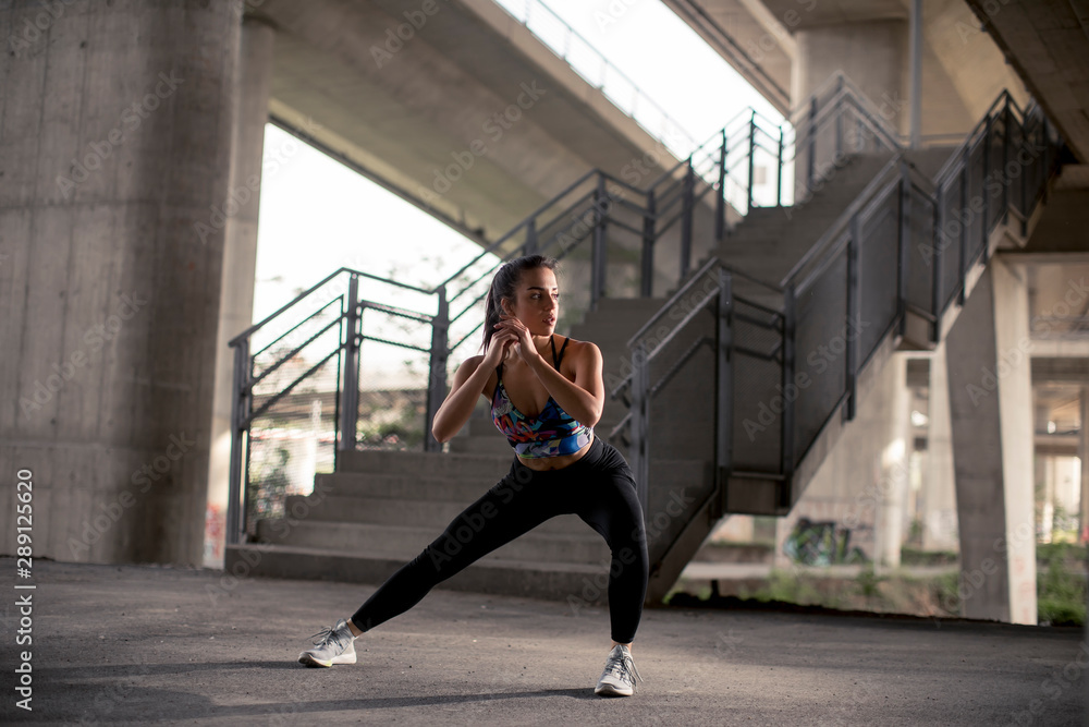 Young woman exercise in urban environment Young woman exercise in urban environment