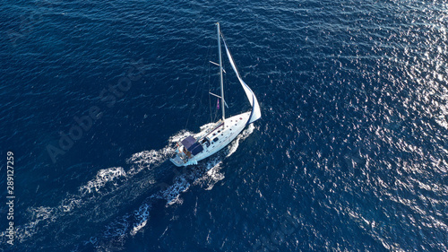 Aerial drone photo of luxury sail boat cruising in the deep blue Aegean sea, Greece © aerial-drone