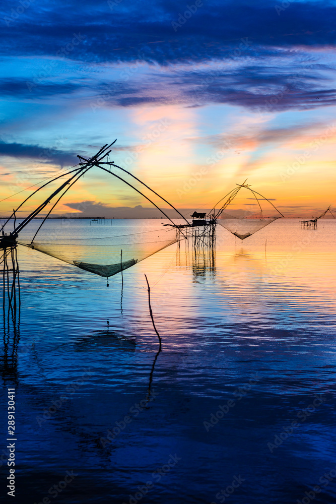 Fishing gear. Bamboo and netting. Of fishermen in Phatthalung Thailand On a beautiful evening light.