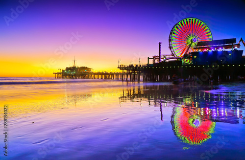 View of Santa Monica Pier on the beach at twilight.
