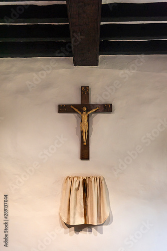 Картината върху платно Cross with crucified Jesus and the Tabernacle on the wall