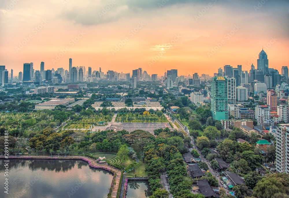Sunset over Benjakiti park in Bangkok