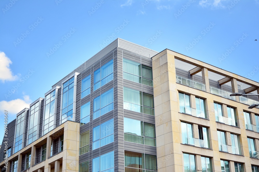 The windows of a modern building for offices. Business buildings architecture. The windows of a modern building for offices. Business buildings architecture.