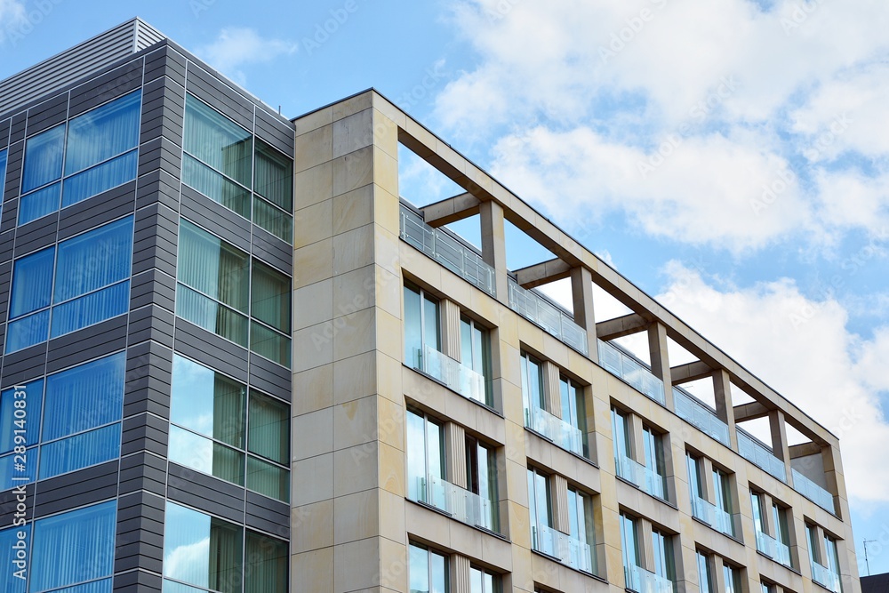 The windows of a modern building for offices. Business buildings architecture. The windows of a modern building for offices. Business buildings architecture.
