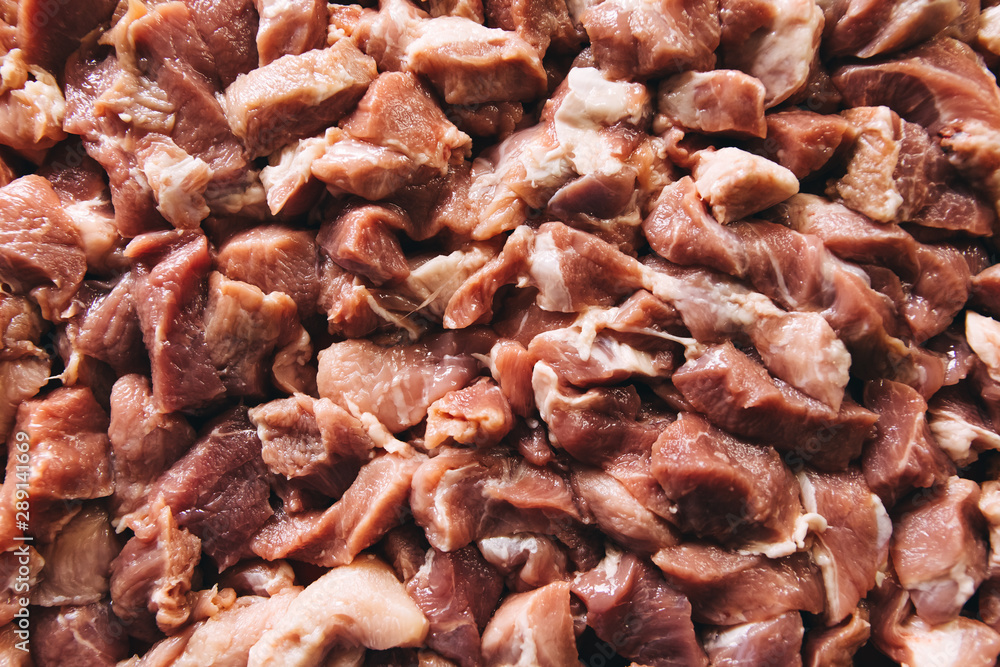 Heap of raw diced beef meat isolated, top view Heap of raw diced beef meat isolated, top view