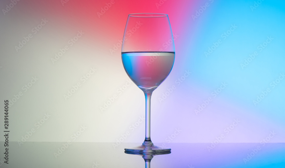 wine glasses dishes on a colored background