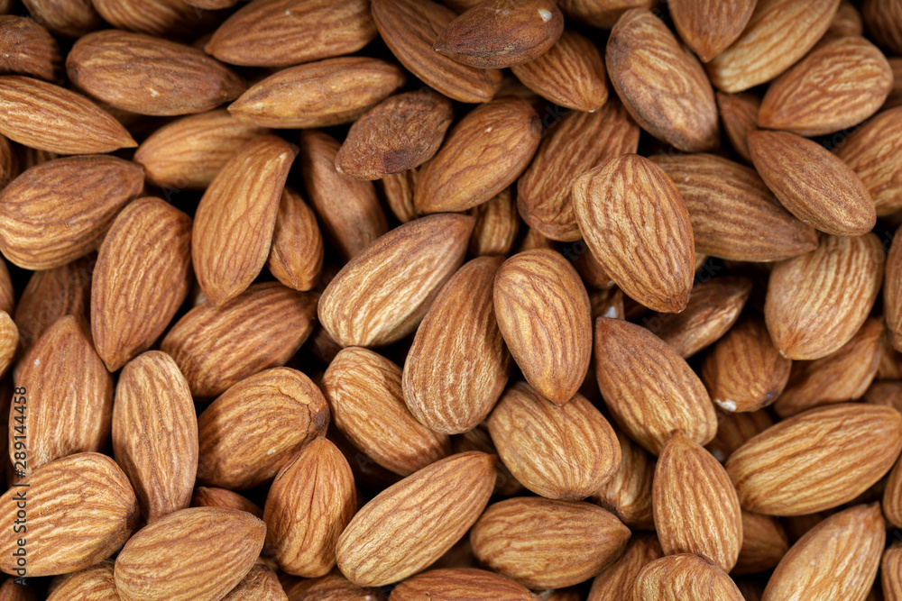 Almond. Almond nuts, close-up isolated on a white background Almond. Almond nuts, close-up isolated on a white background