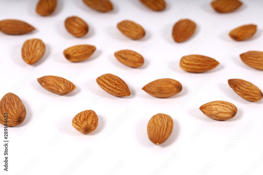 Almond. Almond nuts, close-up isolated on a white background Almond. Almond nuts, close-up isolated on a white background