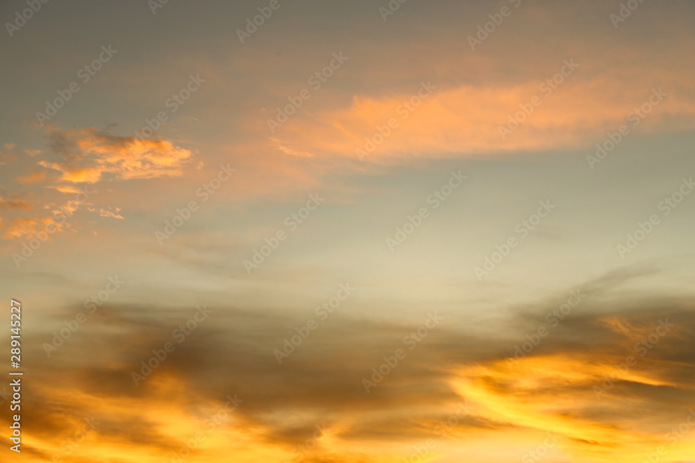 Sky and orange clouds at sunset or dusk