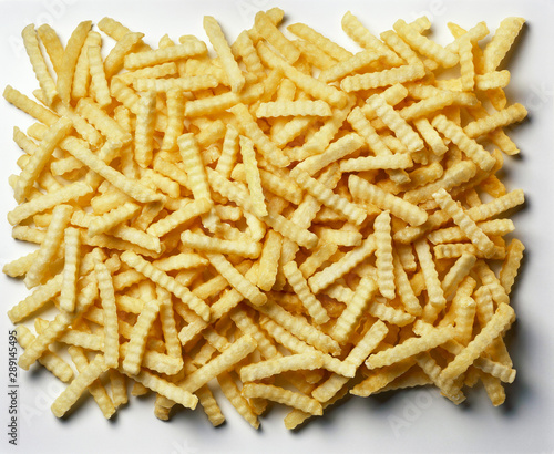 Canvas-taulu Large Pile of cooked Crinkle Chips/fries against white