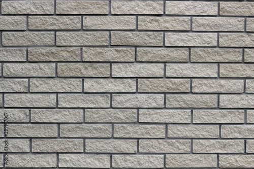 Modern grey brick wall. Space for text or logos