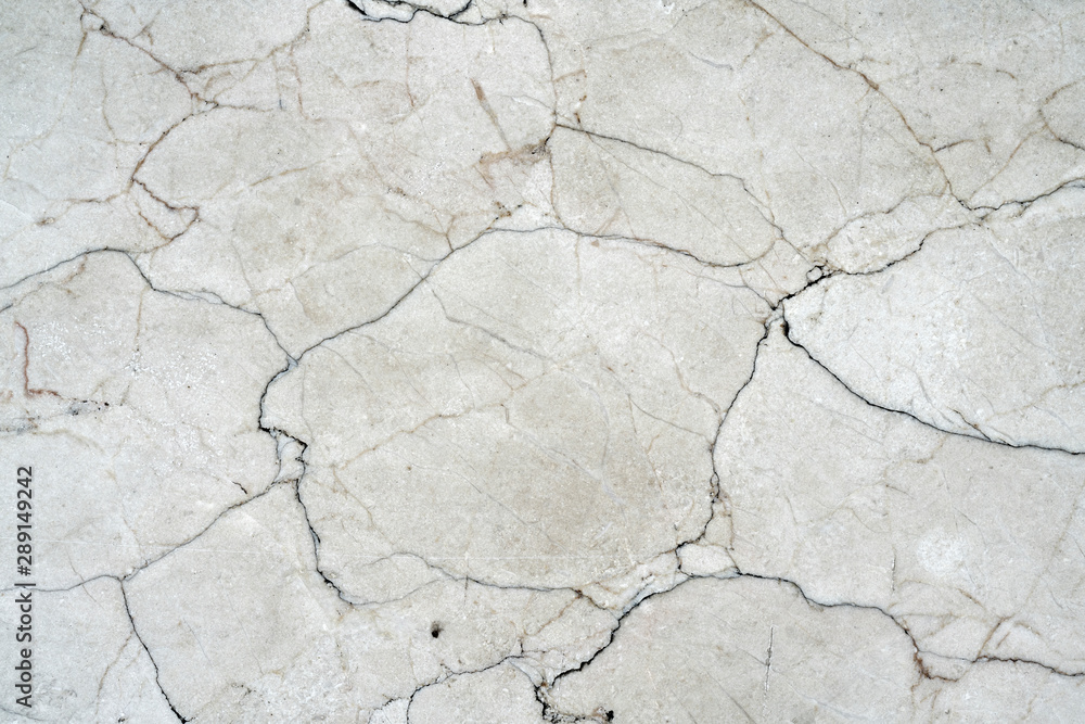 Cracks of gray marble. Wall of house. Construction industry. Cracks of gray marble. Wall of house. Construction industry.