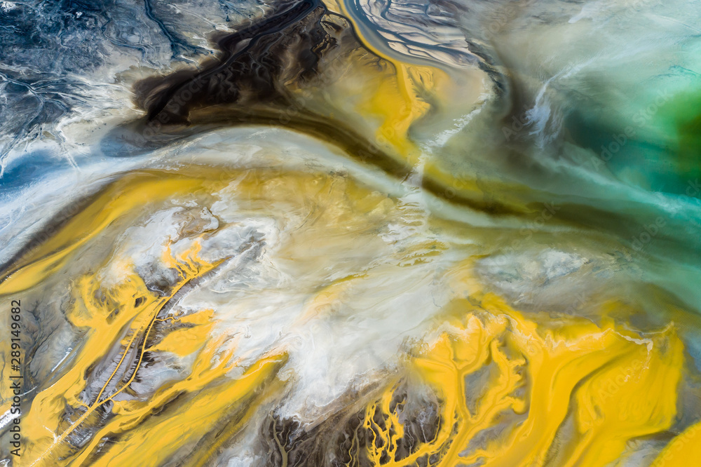 Aerial view of surrealistic industrial place. Human impact on the environment..Degraded landscape.Destroyed land.View from above.