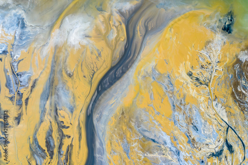 Obraz na płótnie Degraded landscape. Destroyed land. View from above. Surrealistic lake.Human impact on the environment. View from above. Photo captured with drone w salonie