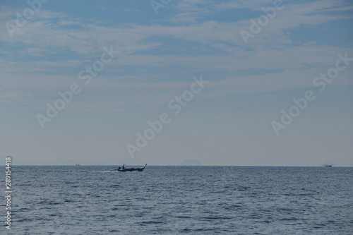 boat and blue sky with sea