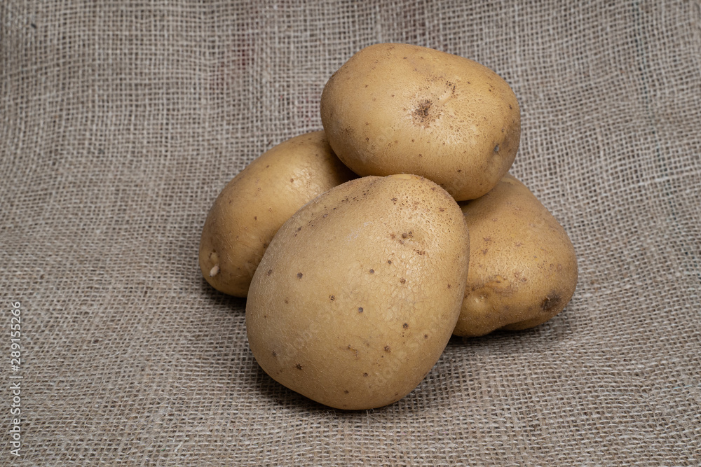 Photograph of a vegetable potato. Fruits vegetables potatoes. Photograph of a vegetable potato. Fruits vegetables potatoes.