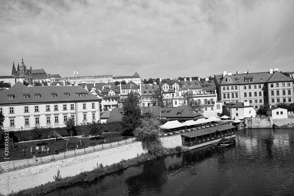 Black and white view of roof tops from the Charles Bridge in Prague