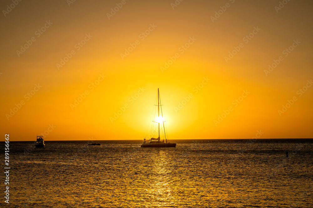 Sailing away at sunset