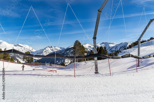 Safety net fencing on the ski slope.