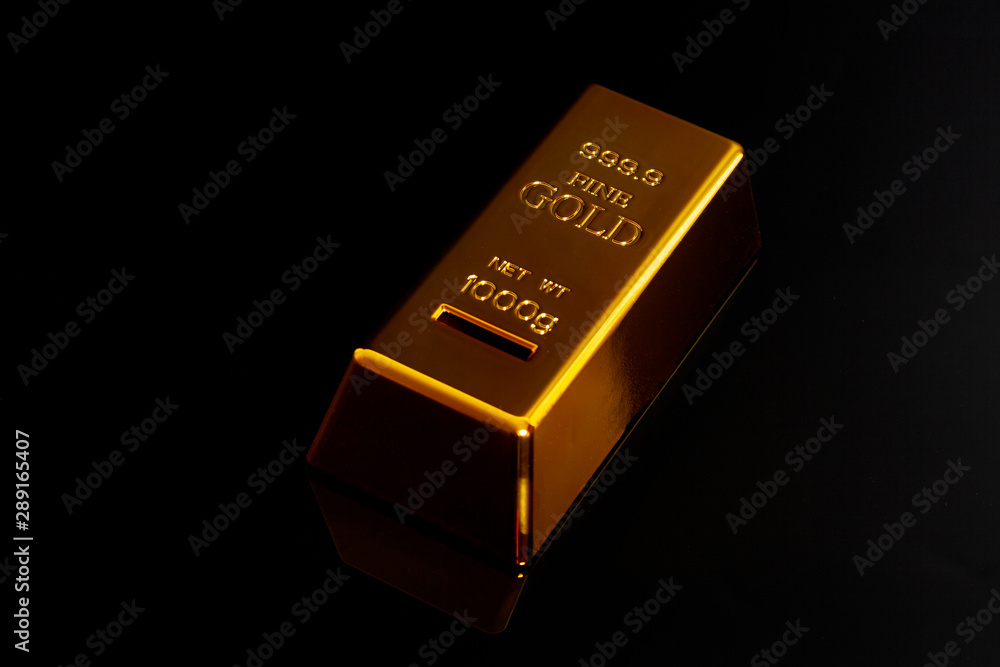 Gold bar on black background. Gold bar on black background.