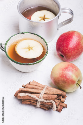 Hot drinks In rural mugs served on wooden plank