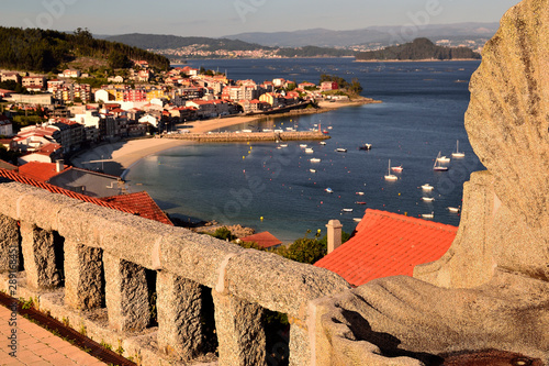 Vistas desde el mirador de la Granxa en la ria de Pontevedra con la isla de Tambo y el pueblo de Raxó, Galicia photo
