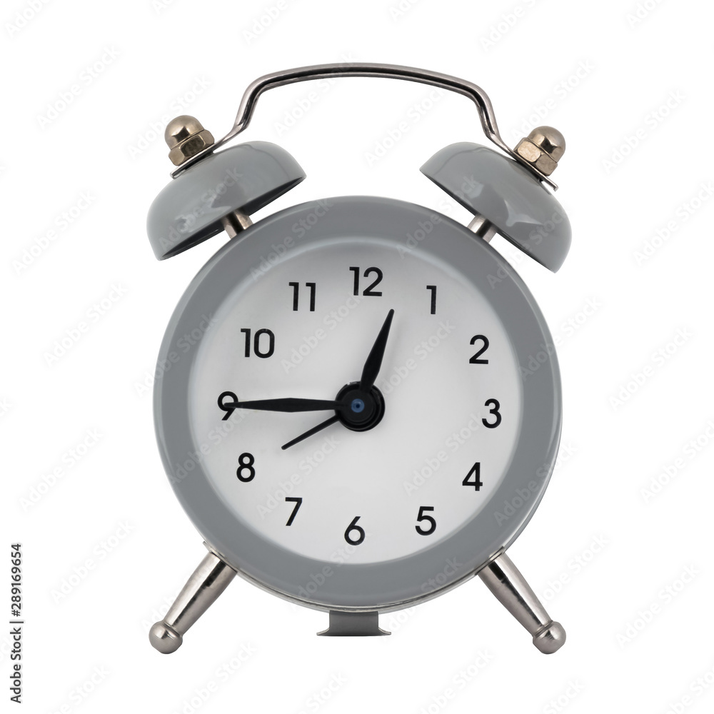 A gray clock with an alarm clock on a white background with arrows showing the time twelve hours forty five minutes or twenty four hours forty five minutes A gray clock with an alarm clock on a white background with arrows showing the time twelve hours forty five minutes or twenty four hours forty five minutes