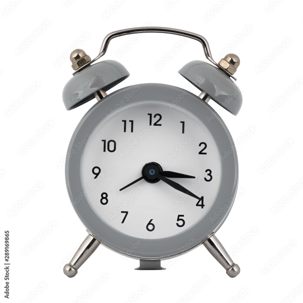A gray clock with an alarm clock on a white background with arrows showing the time three hours twenty minutes or fifteen hours twenty minutes A gray clock with an alarm clock on a white background with arrows showing the time three hours twenty minutes or fifteen hours twenty minutes