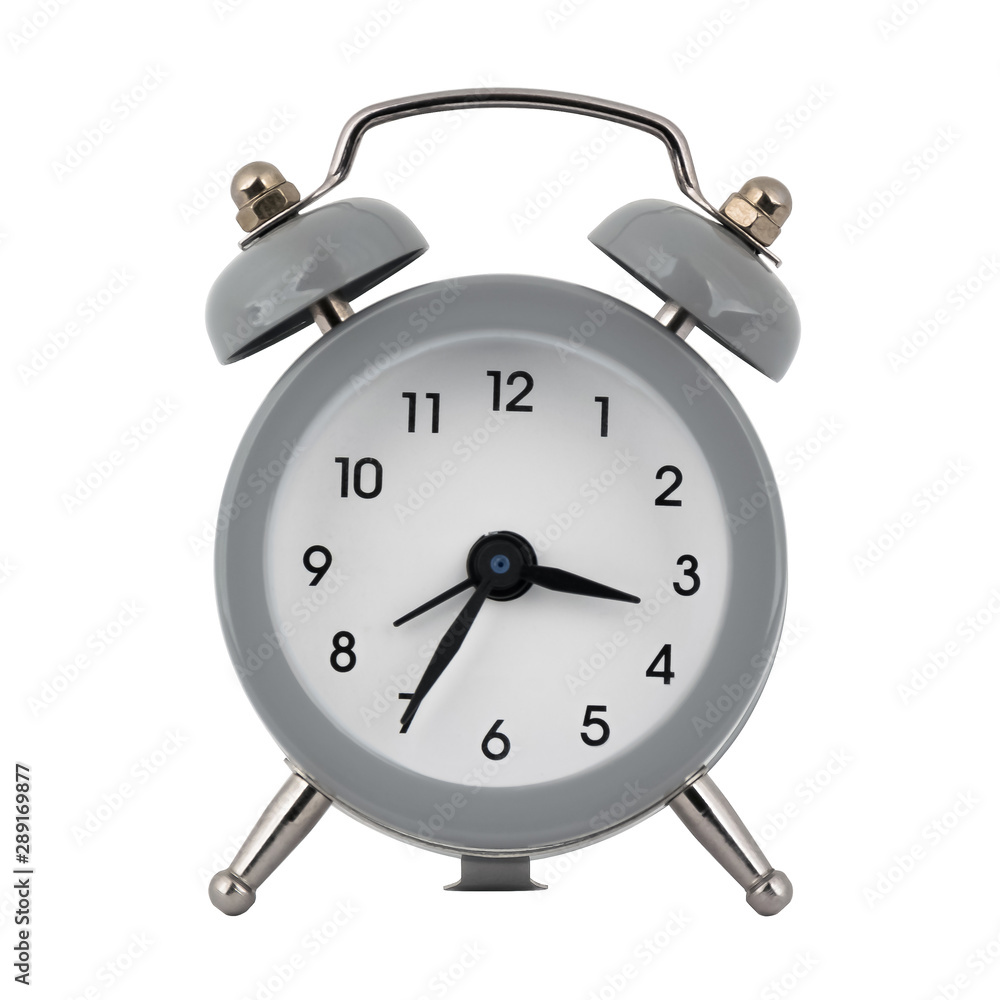 A gray clock with an alarm clock on a white background with arrows showing the time three hours thirty five minutes or fifteen hours thirty five minutes A gray clock with an alarm clock on a white background with arrows showing the time three hours thirty five minutes or fifteen hours thirty five minutes