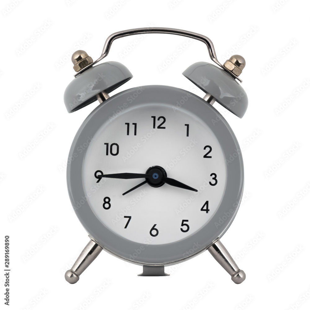 A gray clock with an alarm clock on a white background with arrows showing the time three hours forty five minutes or fifteen hours forty five minutes A gray clock with an alarm clock on a white background with arrows showing the time three hours forty five minutes or fifteen hours forty five minutes