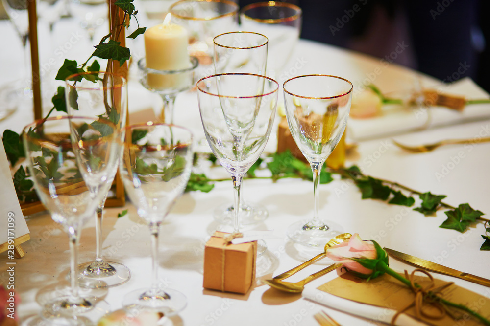 Beautiful table set with candles and flowers Beautiful table set with candles and flowers