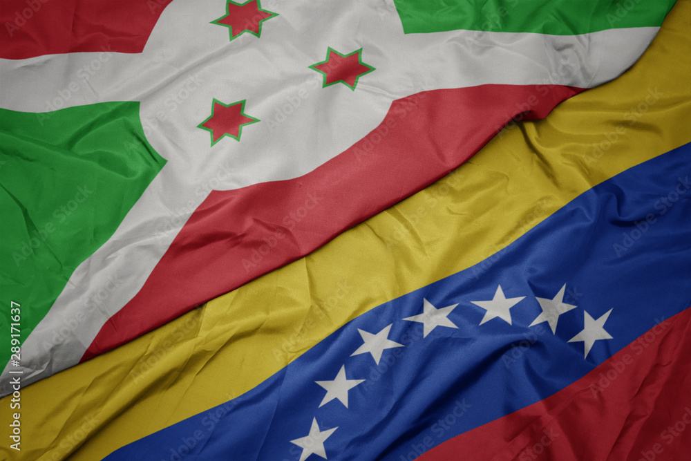 waving colorful flag of venezuela and national flag of burundi . waving colorful flag of venezuela and national flag of burundi .