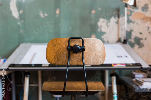 Fotografie Drafting Table With Vintage Wooden Stool