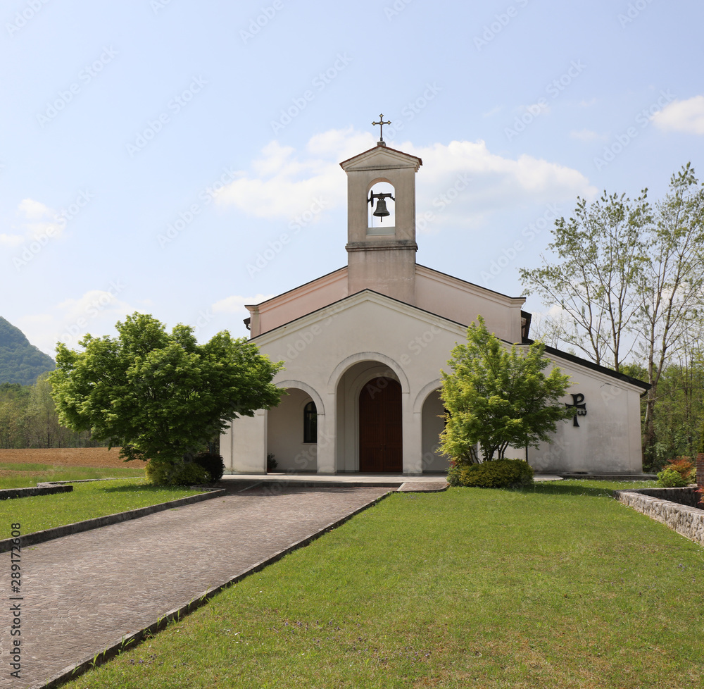 small white church in the Cimano Town in Northern Italy