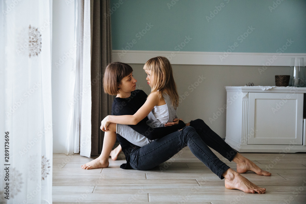 Close Up Of Affectionate Mother And Daughter At Home Close Up Of Affectionate Mother And Daughter At Home
