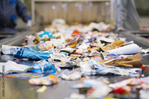 Fotografie view of waste paper on a conveyor belt