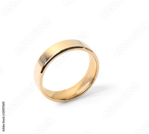Shiny gold wedding ring on white background