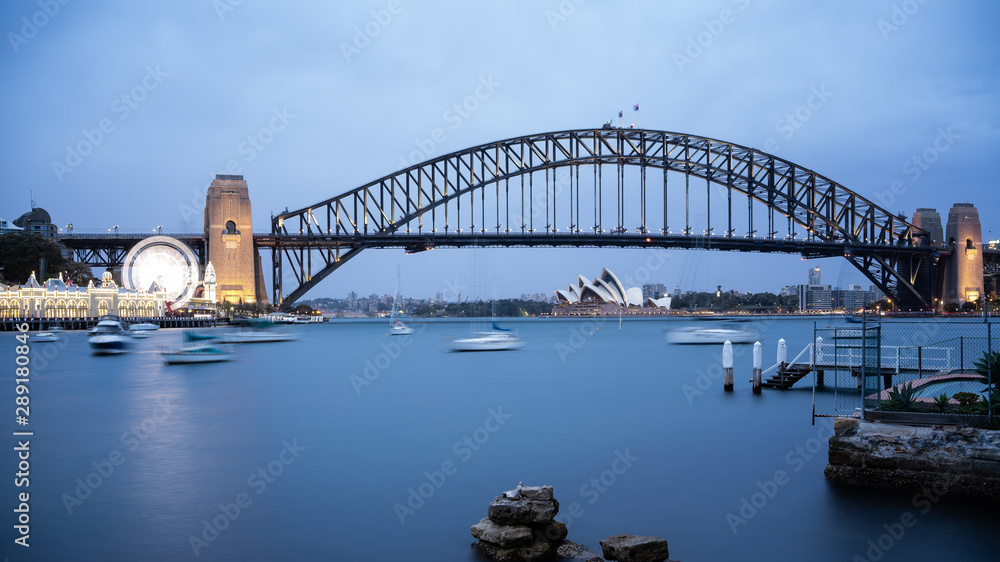 Fototapeta premium Sydney Harbour Bridge and Luna Park at Dusk