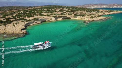 Wallpaper Mural Aerial drone video of picturesque and traditional tourist vessel cruising in famous beaches of Koufonisi island, Small Cyclades, Greece Torontodigital.ca