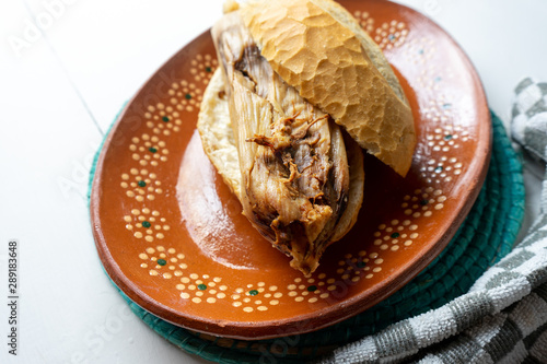 Mexican mole tamal sandwich also called 