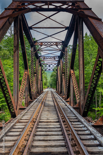 Fototapeta Naklejka Na Ścianę i Meble -  Abandoned railroad testle and tracks