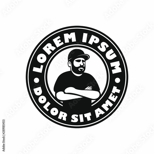 Bearded Man Wearing Hat Crossing arms in Round Badge Logo Vector