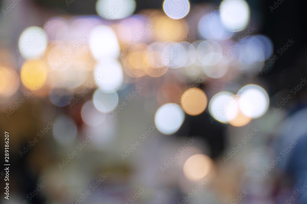 Abstract blurred soft bright light bokeh in department store. Defocused shiny colorful circle light in the mall. Background concept.