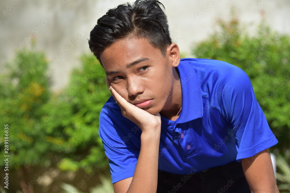An Unhappy Young Filipino Person An Unhappy Young Filipino Person