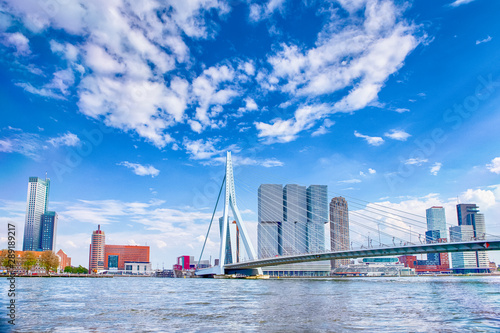 Attractive View of Renowned Erasmusbrug (Swan Bridge) in  Rotterdam in front of Port and Harbour. Picture Made At Day. photo