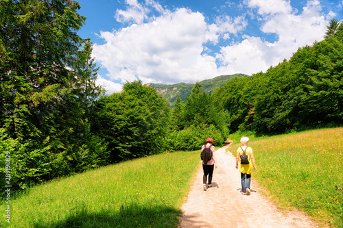 Backpackers hiking and Scenery of Bohinj Lake in Slovenia