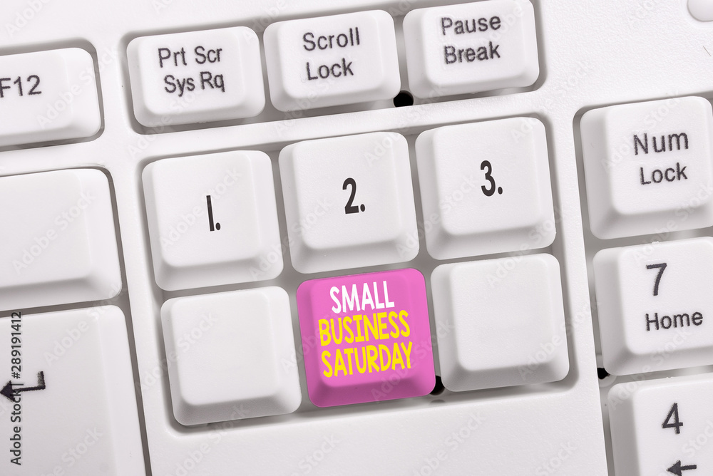 Conceptual hand writing showing Small Business Saturday. Concept meaning American shopping holiday held during the Saturday White pc keyboard with note paper above the white background Conceptual hand writing showing Small Business Saturday. Concept meaning American shopping holiday held during the Saturday White pc keyboard with note paper above the white background
