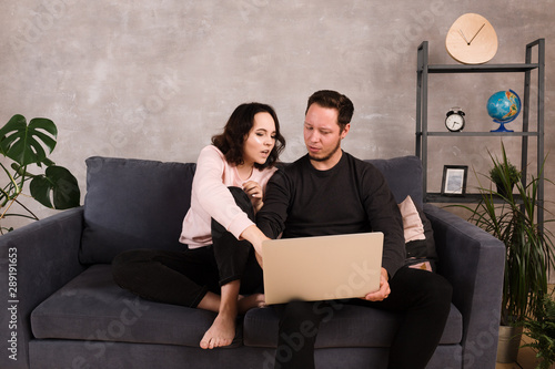 A man and a girl choose plane tickets. Quarrel, swear, rejoice