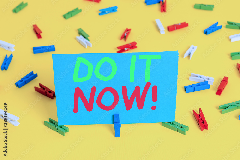 Writing note showing Do It Now. Business concept for not hesitate and start working or doing stuff right away Colored clothespin papers empty reminder yellow floor background office Writing note showing Do It Now. Business concept for not hesitate and start working or doing stuff right away Colored clothespin papers empty reminder yellow floor background office